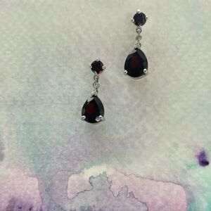 dark garnet dangling earrings set in 10 karat white gold